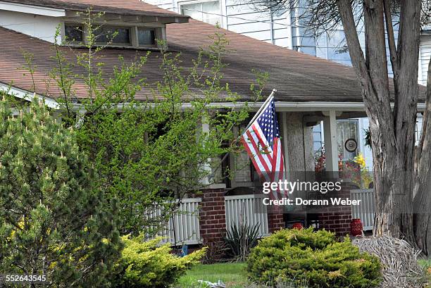 Small home in Mount Holly, New Jersey with an American Flag April 28, 2015