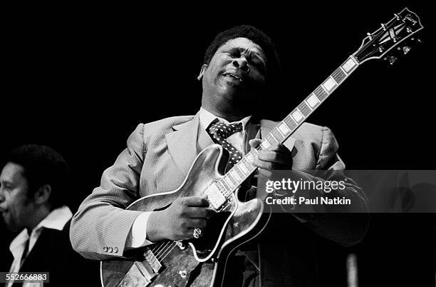 American Blues musician BB King plays guitar as he performs onstage, early 1990s.