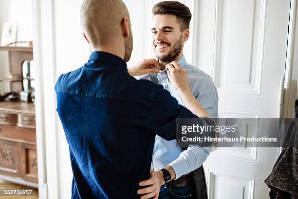 Gay Couple Getting Ready For The Day