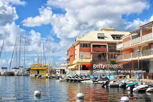 the waterfront at marigot, st martin - saint martin caraibi stock-fotos und bilder