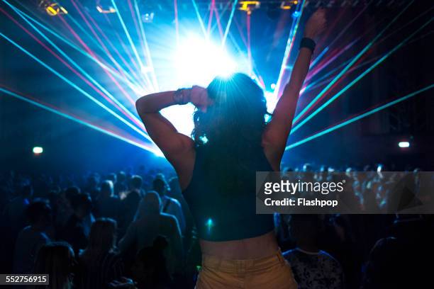portrait of woman having fun at music event - bash 2015 concert stock-fotos und bilder