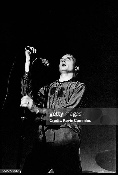 Singer Ian Curtis performing with rock group Joy Division at the Mayflower Club, Manchester, 28th July 1979.