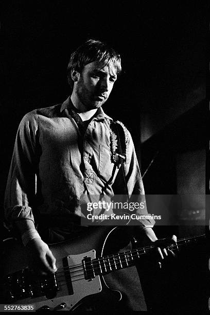 Bassist Peter Hook performing with English rock group Joy Division at the Russell Club, also known as The Factory, Manchester, 1979.