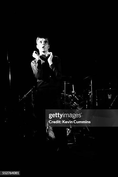 Singer Ian Curtis performing with English rock group Joy Division, at the Russell Club, also known as The Factory, Manchester, 1979.
