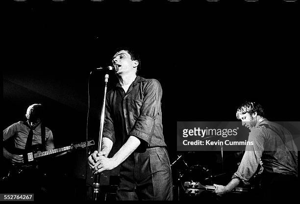 English rock group Joy Division performing at the Russell Club, also known as The Factory, Manchester, 1979. Left to right: guitarist Bernard Sumner,...