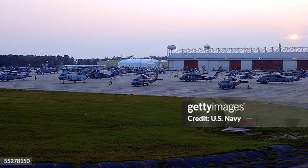 Navy helicopters are prepared for a day of search and rescue operations for victims of Hurricane Katrina at the Naval Air Station September 5, 2005...