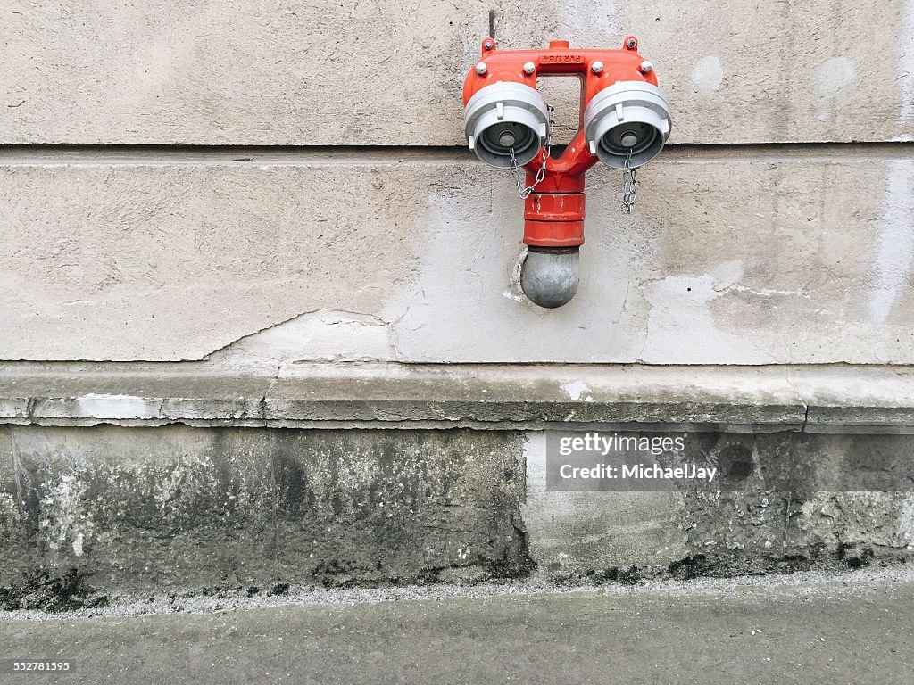 Red Fire Hydrant On Wall