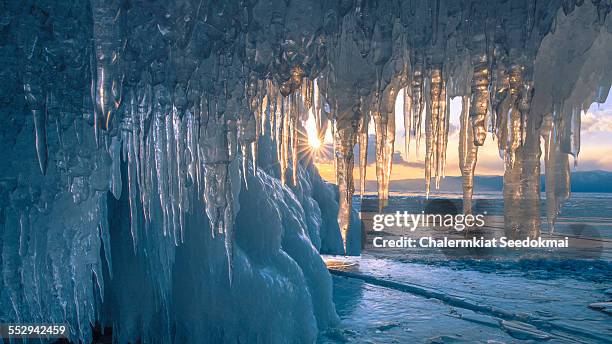 icicle at baikal lake - eiszapfen stock-fotos und bilder