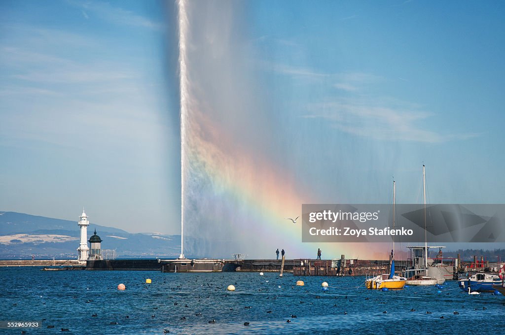 Rainbow on Jet d'Eau fountain on lake Geneva