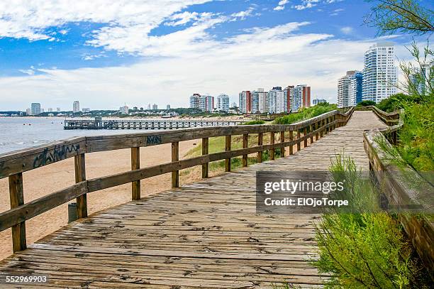 boardwalk and beach in punta del este, uruguay - punta del este stock pictures, royalty-free photos & images