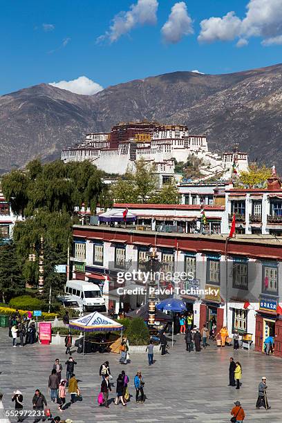 potala palace from barkhor square - national committee of the chinese people stock pictures, royalty-free photos & images