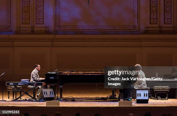 American Jazz musicians Herbie Hancock and Chick Corea perform together during a duo piano concert at Carnegie Hall, New York, New York, April 9,...