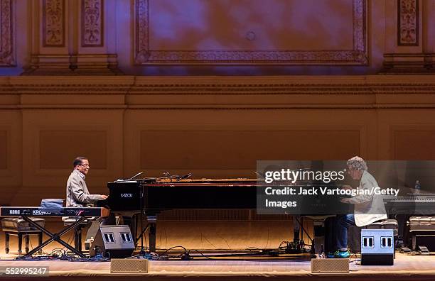 American Jazz musicians Herbie Hancock and Chick Corea perform together during a duo piano concert at Carnegie Hall, New York, New York, April 9,...