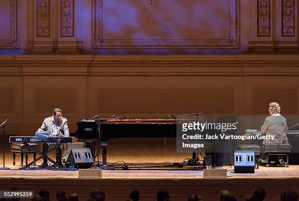 American Jazz musicians Herbie Hancock and Chick Corea perform together during a duo piano concert at Carnegie Hall, New York, New York, April 9,...