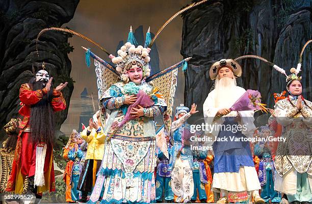 After her performance , Chinese opera actor and director Qi Shu Fang takes a bow with her Qi Shu Fang Peking Opera Company at a World Music Institute...