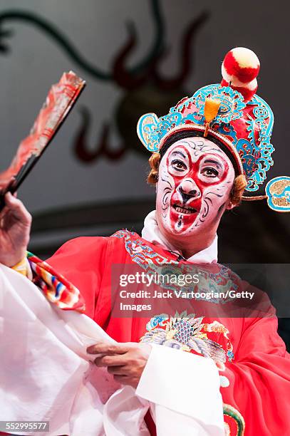 Chinese opera actor Ding Meikui of the Qi Shu Fang Peking Opera Company performs in 'The Monkey King Havoc in Imperial Stables' at a World Music...