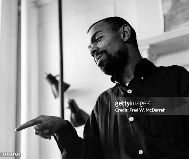 American poet and playwright LeRoi Jones points his finger in a Chelsea apartment, New York, New York, September 20, 1959.
