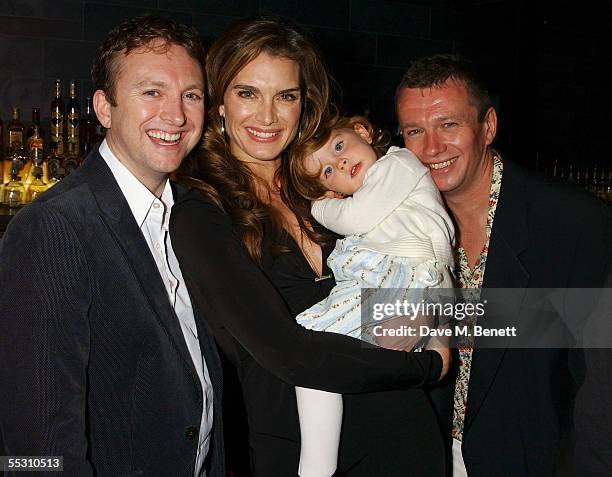 Actress Brooke Shields and her daughter Rowan pose with guests during Shields's 40th birthday celebration at the Mint Leaf restaurant in London's...