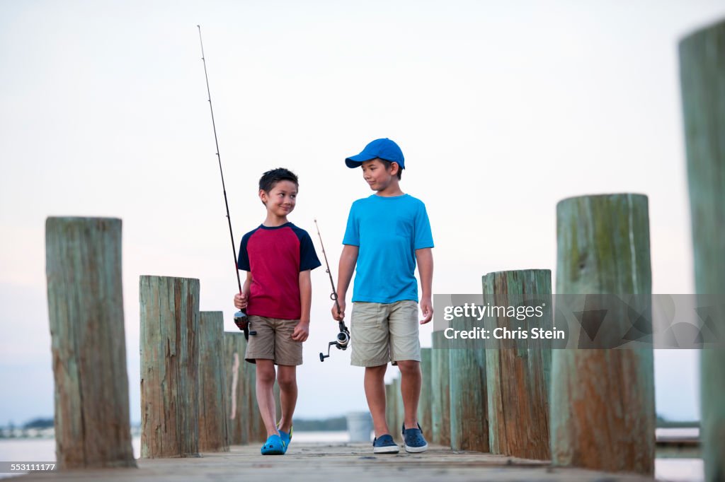 Young Asian Brothers on a Fishing Pier