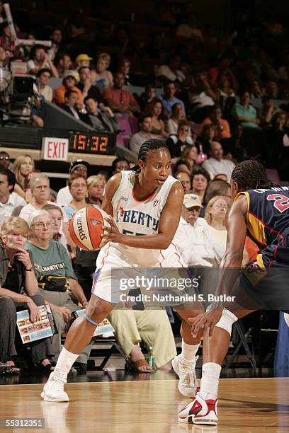 Vickie Johnson of the New York Liberty handles the ball in Game One of the first round of the Eastern Conference playoffs against the Indiana Fever...