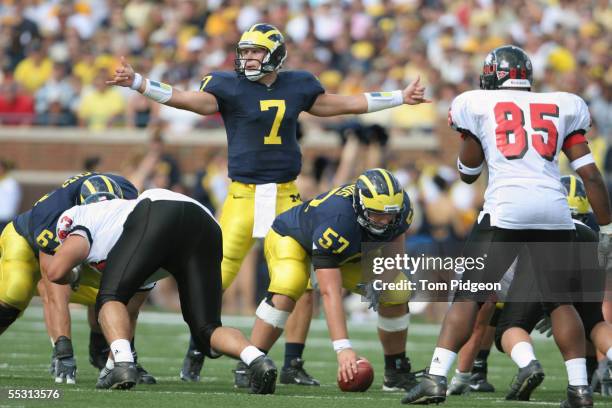 Quarterback Chad Henne of the Michigan Wolverines calls a play against the Northern Illinois Huskies during the game at Michigan Stadium on September...