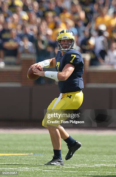 Quarterback Chad Henne of the Michigan Wolverines drops back to pass against the Northern Illinois Huskies during the game at Michigan Stadium on...