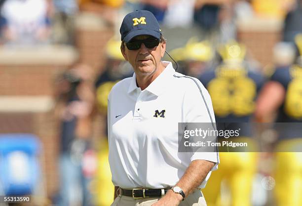 Head Coach Lloyd Carr of the Michigan Wolverines looks on against the Northern Illinois Huskies during the game at Michigan Stadium on September 3,...