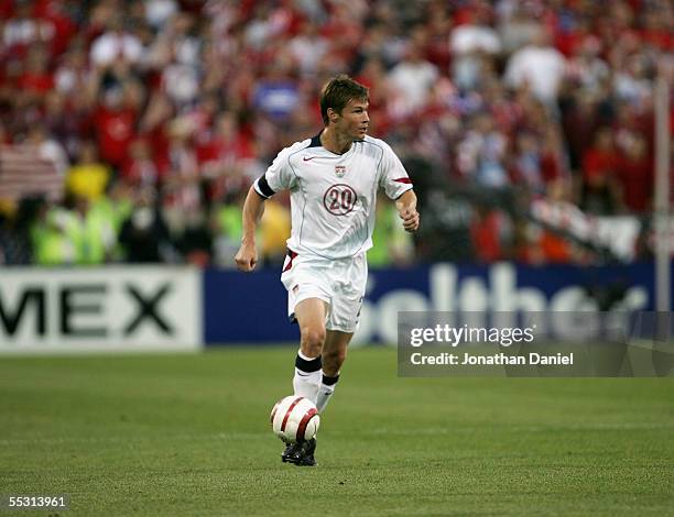 Brian McBride of the USA dribbles the ball against Mexico during the 2006 World Cup Qualifying match at Crew Stadium on September 3, 2005 in...