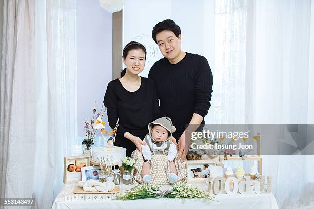 family celebrate 100 day birthday - korea tradition stock pictures, royalty-free photos & images