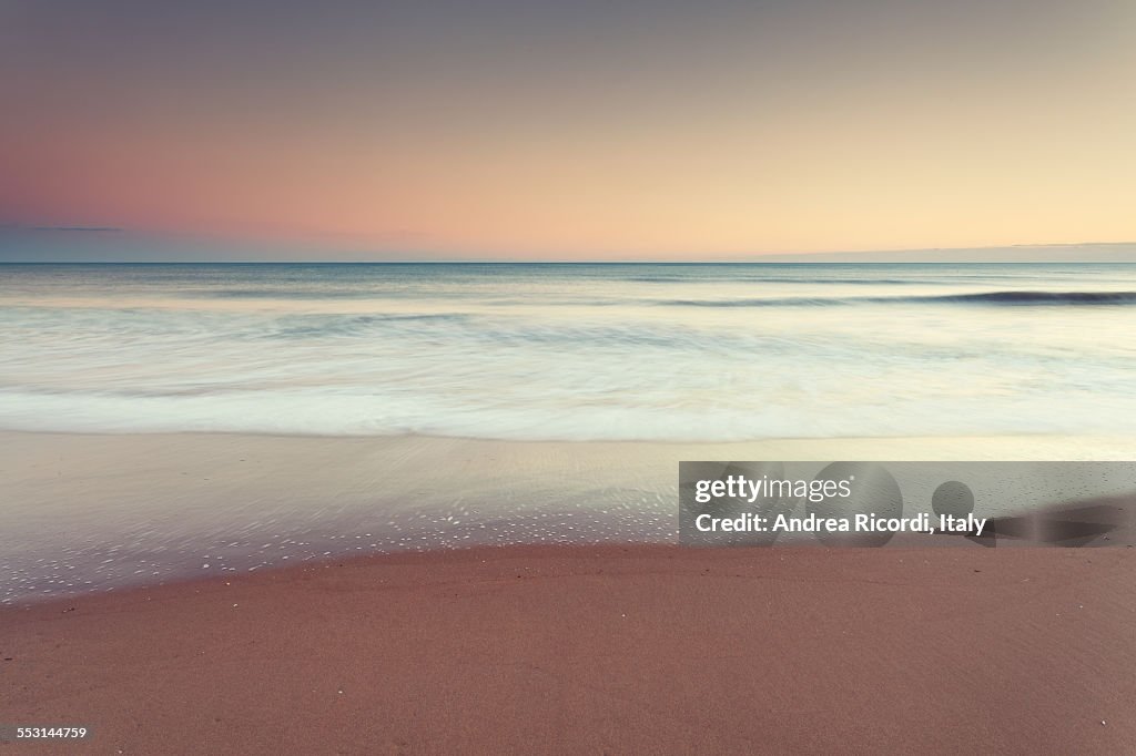 Mediterranean beach at sunset