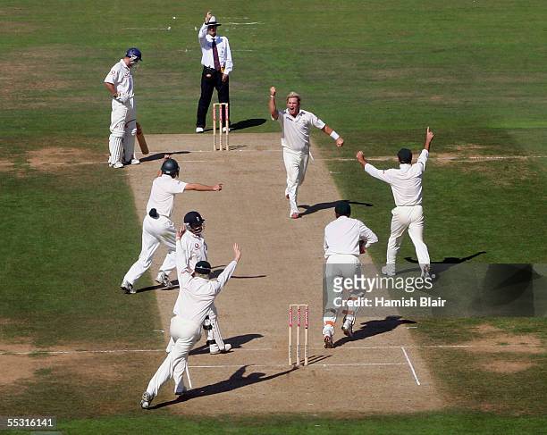 Shane Warne of Australia celebrates the wicket of Ian Bell of England LBW during day one of the Fifth npower Ashes Test between England and Australia...