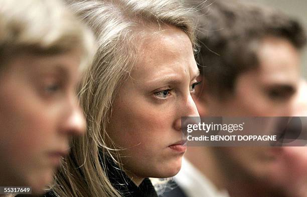 Picture dated 18 January 2005 shows from L-R Prince Joachim, Princess Maria Laura and Prince Amedeo of Belgium attending the mass to commemorate the...