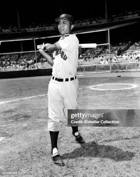 Outfielder Larry Doby of the Cleveland Indians poses for an action portrait prior to a circa 1950s game against the New York Yankees at Yankee...