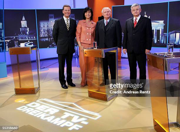 Guido Westerwelle , Maybrit Illner , Oskar Lafontaine and Joschka Fischer pose for a photograph before a live televised debate on September 8, 2005...
