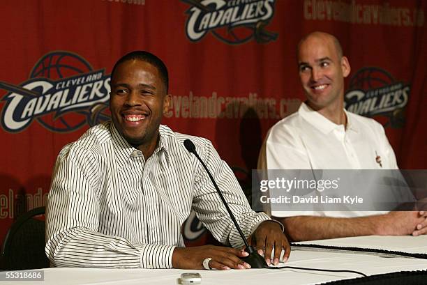 Damon Jones smiles as he and Danny Ferry attend a media conference to announce Jones' four year contract deal with the Cleveland Cavaliers on...