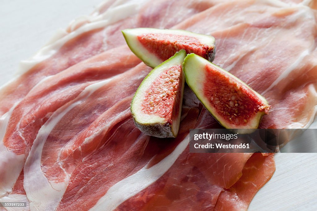 Parma ham and three slices of fig