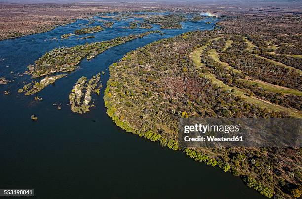 southern africa, victoria falls between zambia and zimbabwe - zambezi river stockfoto's en -beelden