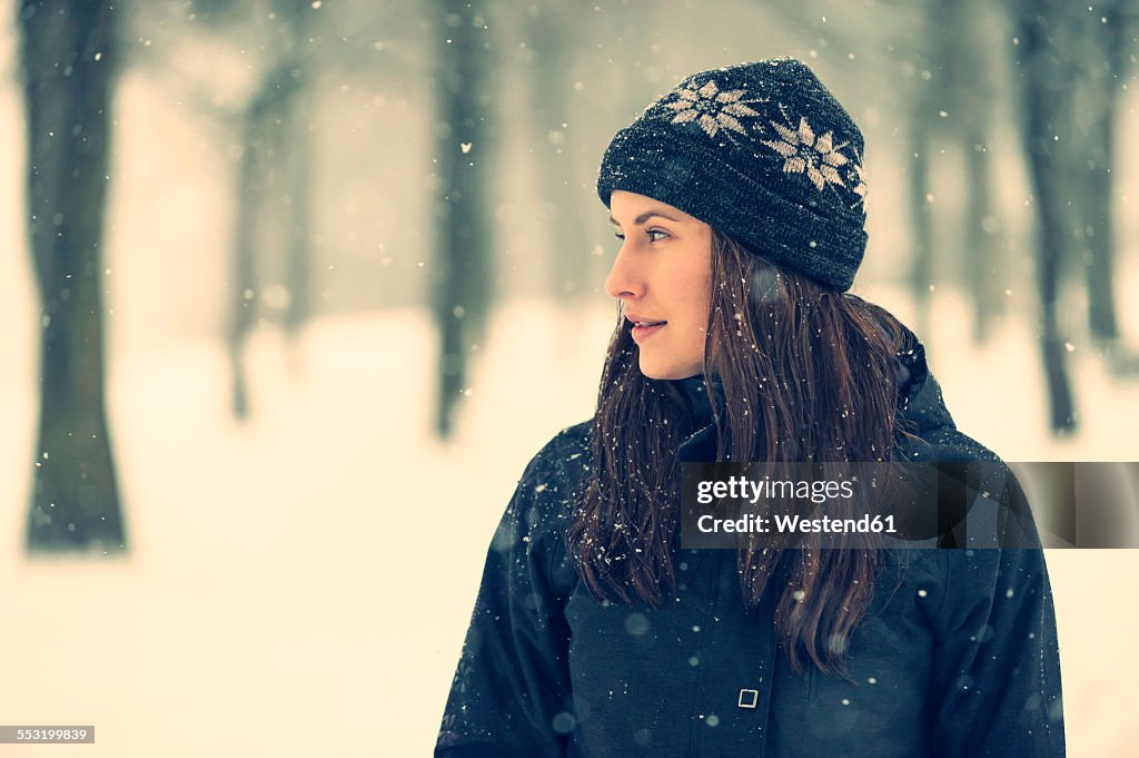 Young woman wearing wool cap in winter