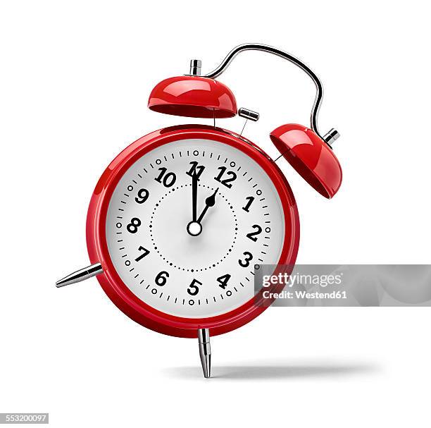 red clock in front of white background - alarm clock white background stock pictures, royalty-free photos & images