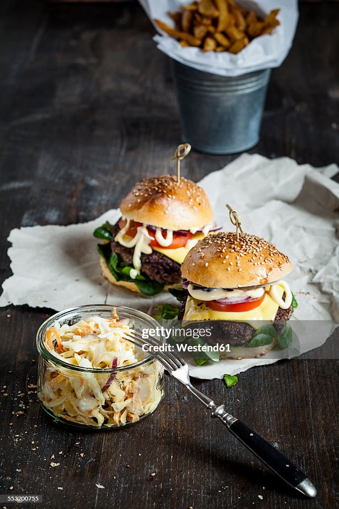 Homemade cheeseburger, coleslaw and french fries