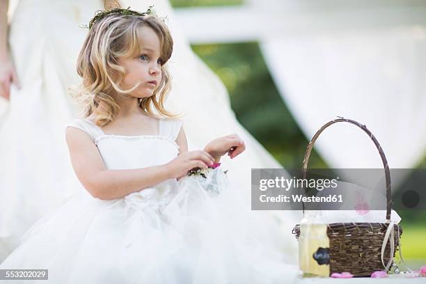 flower girl at a wedding - flower girl stock pictures, royalty-free photos & images