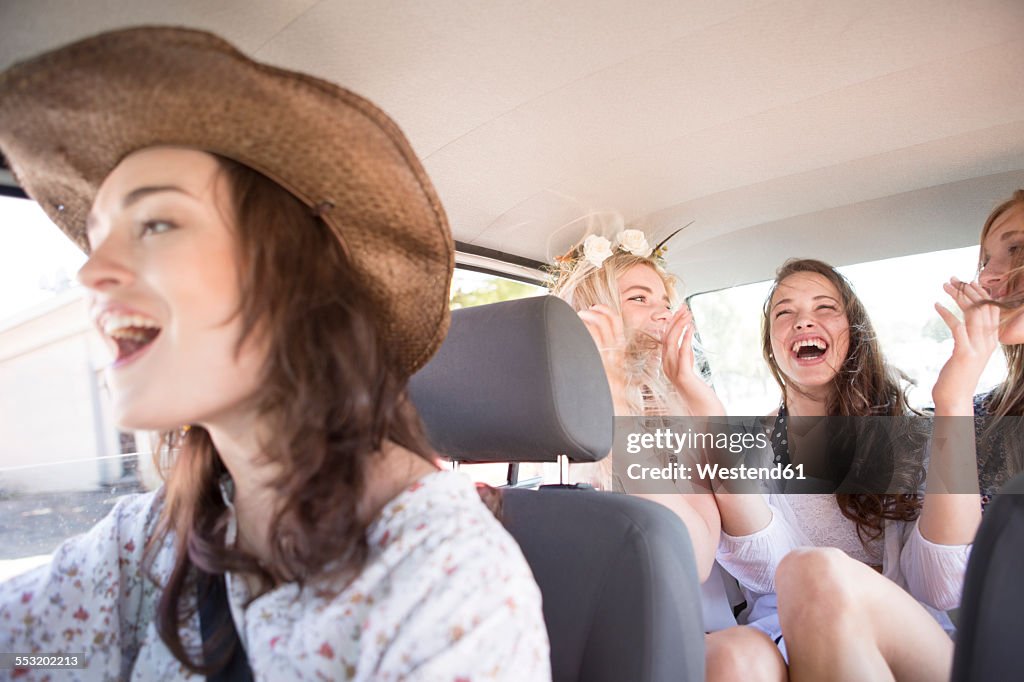 South Africa, Friends on a road trip driving in car