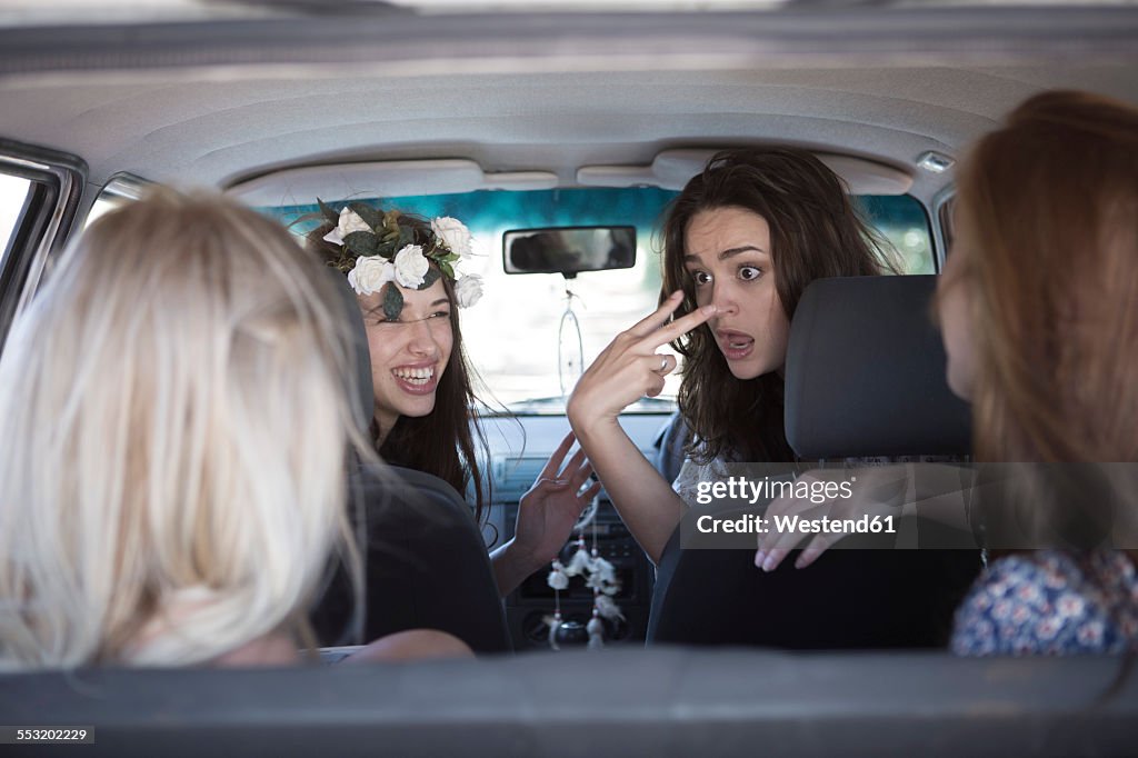 South Africa, Friends on a road trip talking in car