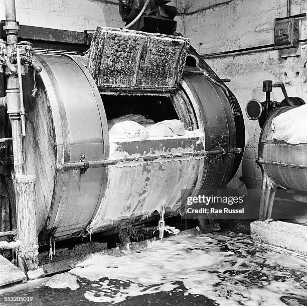 View of an industrial washing machine used to clean cloth diapers by the Crib Diaper Service, Long Island, New York, June 1947.