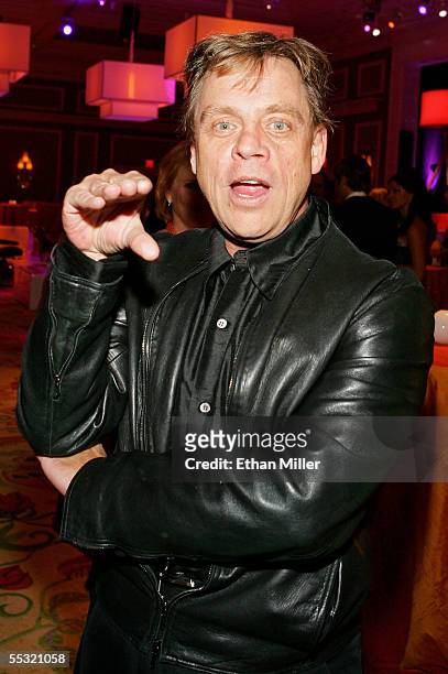 Actor Mark Hamill mimics using a puppet at the after party for the Las Vegas premiere of the Tony Award-winning Broadway musical "Avenue Q" at the...