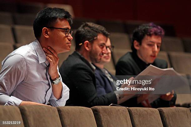 Young Juilliard composers and the conductor Jeffrey Milarsky with the Juilliard Orchestra in rehearsal at Alice Tully Hall on Tuesday morning, April...