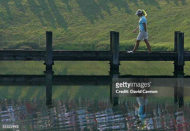 European team member Suzann Pettersen of Norway walks to the fourth tee during her match against Michele Redman and Laura Diaz of the USA during the...