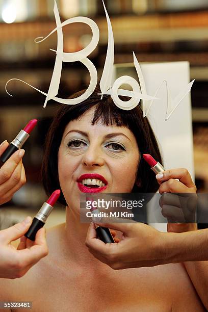 Tatler Fashion Director Isabella Blow poses for photographers, to launch her limited edition MAC Cosmetics lipstick "Blow" at Harvey Nichols on...