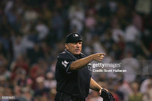 Umpire Ed Montague makes a call during the game between the Tampa Bay Devil Rays and the Boston Red Sox at Fenway Park on August 30, 2005 in Boston,...