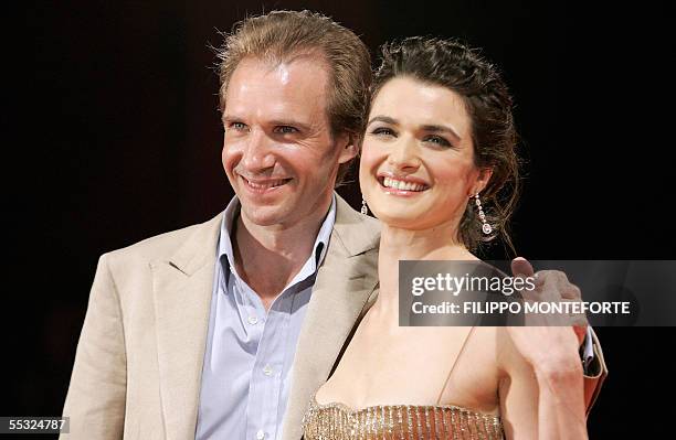 Actress Rachel Weisz and actor Ralph Fiennes pose for photographers at their arrival at the premiere of their movie 'The Constant Gardener' at the...